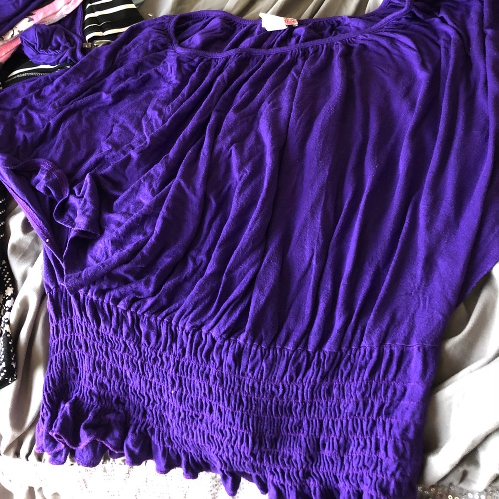 Purple shirt with flare arms